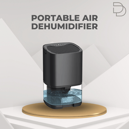 Portable air dehumidifier with water tank on a geometric background, featuring the Drelax brand.