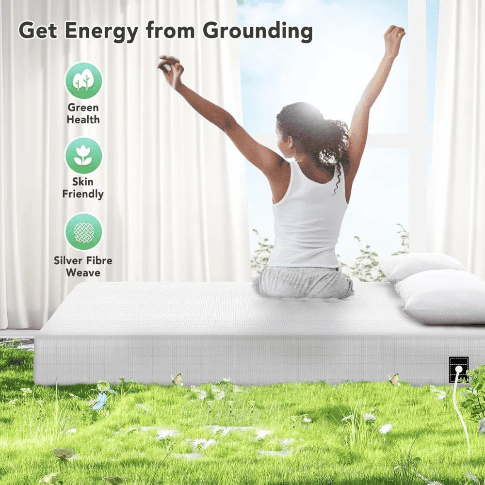 Woman stretching on bed with Grounding Fitted Bed Sheet, reconnecting with earth’s energy for deeper, restorative sleep.